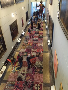 This hall has rugs reprenting every country of immigrant citizens