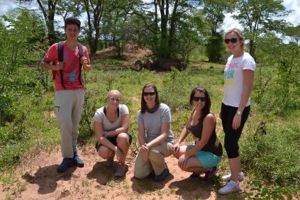 Volunteer photo in front of the rhinos